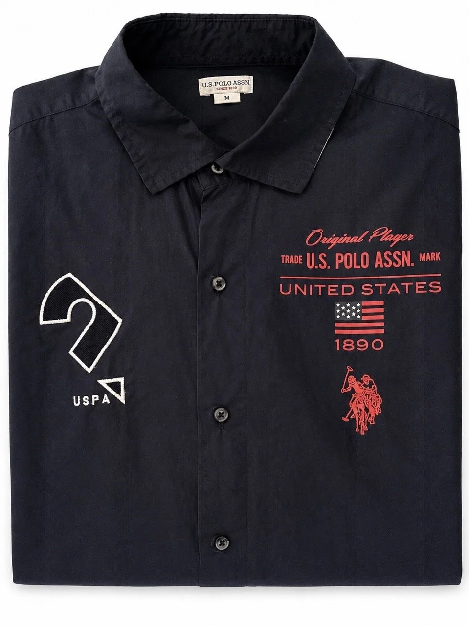 U.S. Polo Assn. navy shirt close-up logo embroidery and front print detail