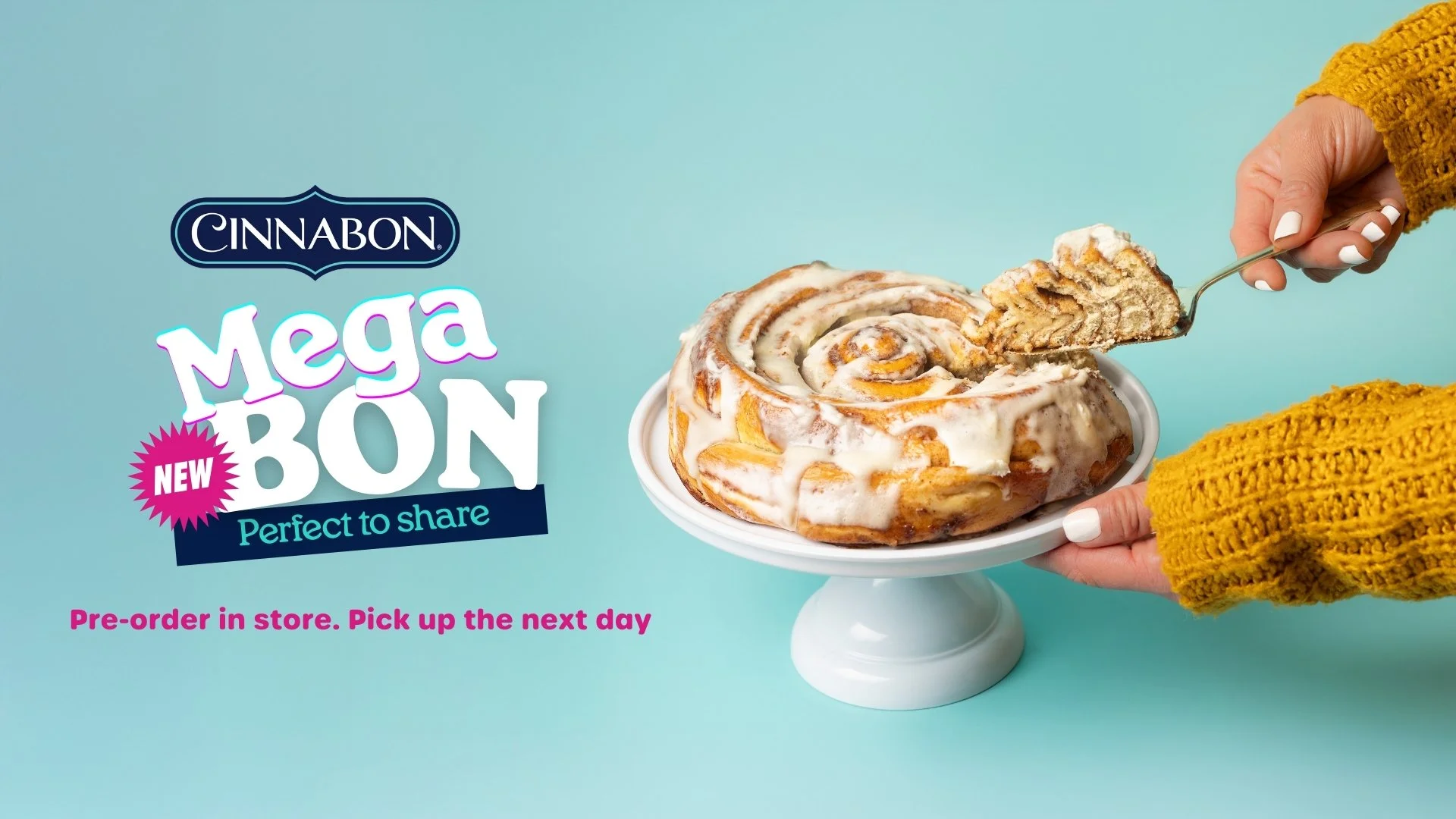 Extra-large MegaBon cinnamon roll with thick layers of cinnamon and cream cheese frosting