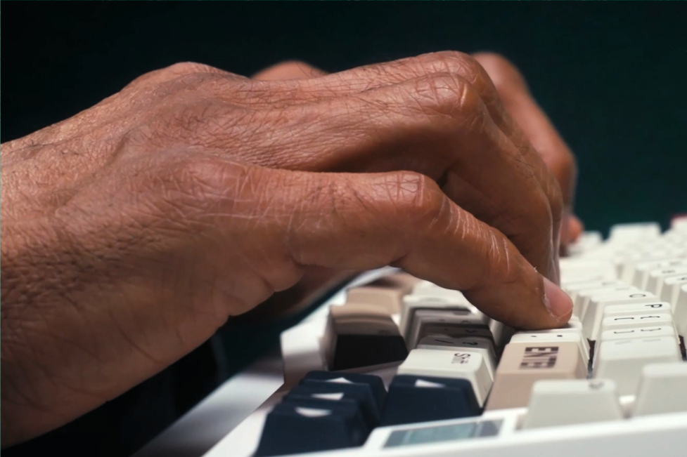 Hand Model Male - Dylan Jawahir Closeup of Right Hand Typing on Computer Keyboard