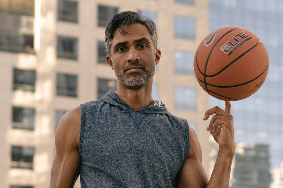 Dylan Jawahir Model Actor Spinning Basketball in Urban Environment