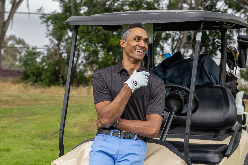 Dylan Jawahir Model Actor Sitting on Golf Cart Laughing at His Ridiculous Life