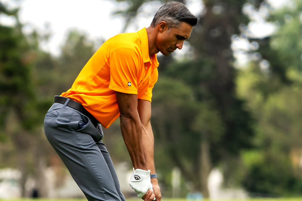 Dylan Jawahir Model Actor Getting Ready to Swing Golf Club on the Golf Course