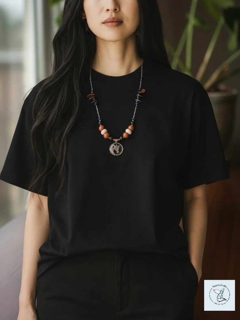 Black Horse

Worn close.
Felt quietly.

This piece carries weight without heaviness &mdash;
layered with stone, texture, and intention.
Designed to move with the body
while remaining grounded at its core.

Handcrafted by Mayrts Studio.
One-of-a-kind.