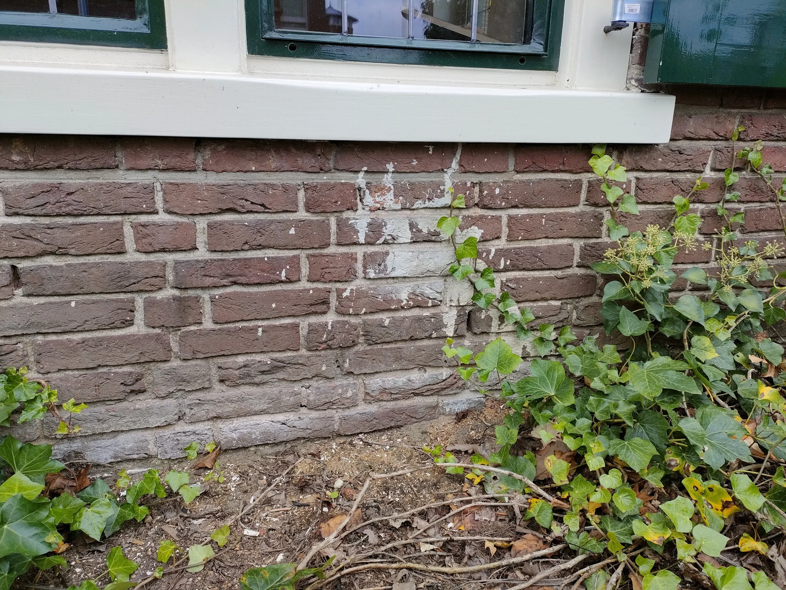 baksteen verf verwijderen