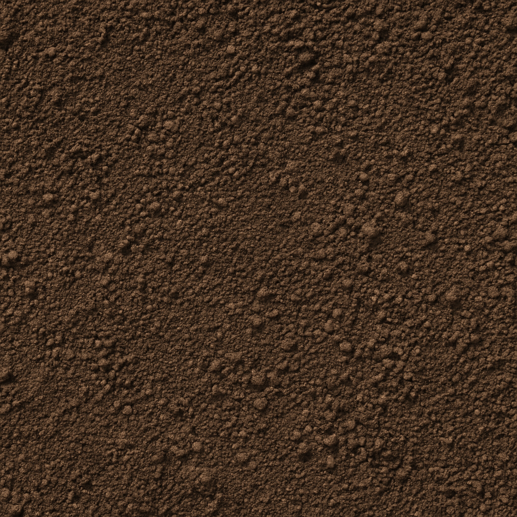 Close-up of finely textured, brown cocoa powder.