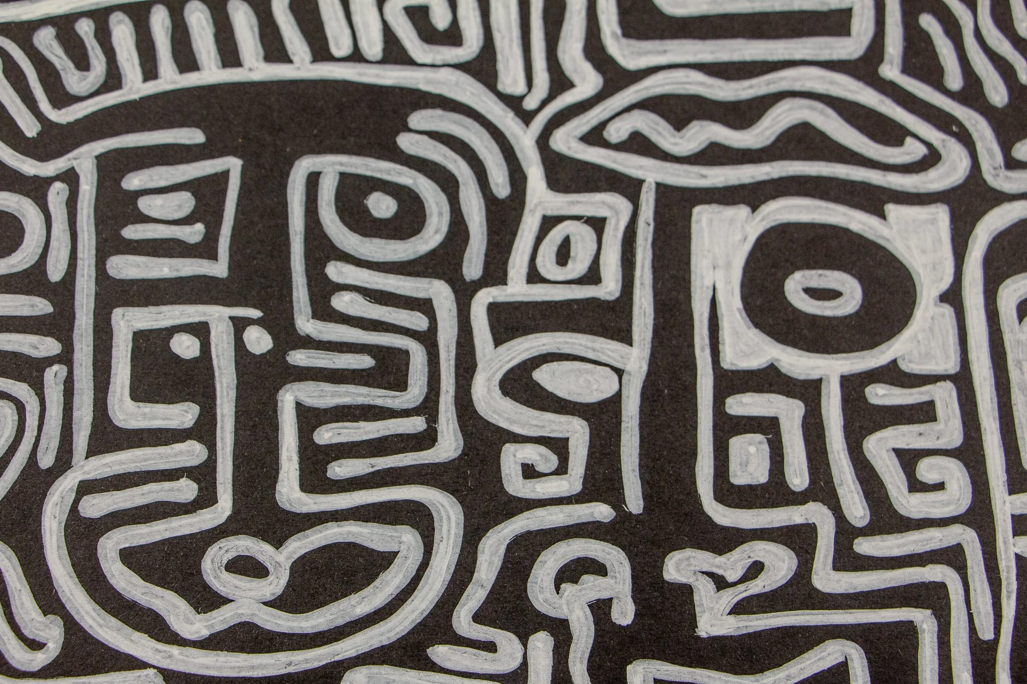 Mêlée of Discovery 003 detail: close-up centered on a face-like figure and surrounding motifs, emphasizing the work’s compressed energy and its rhythm of repetition and variation.