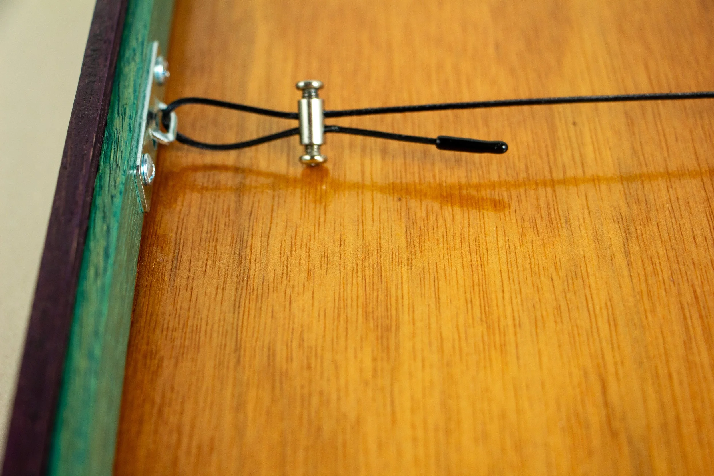 Formless Equation 001 frame: reverse, steel hanging wire with adjustable barrel clamp fixed to mounting plate