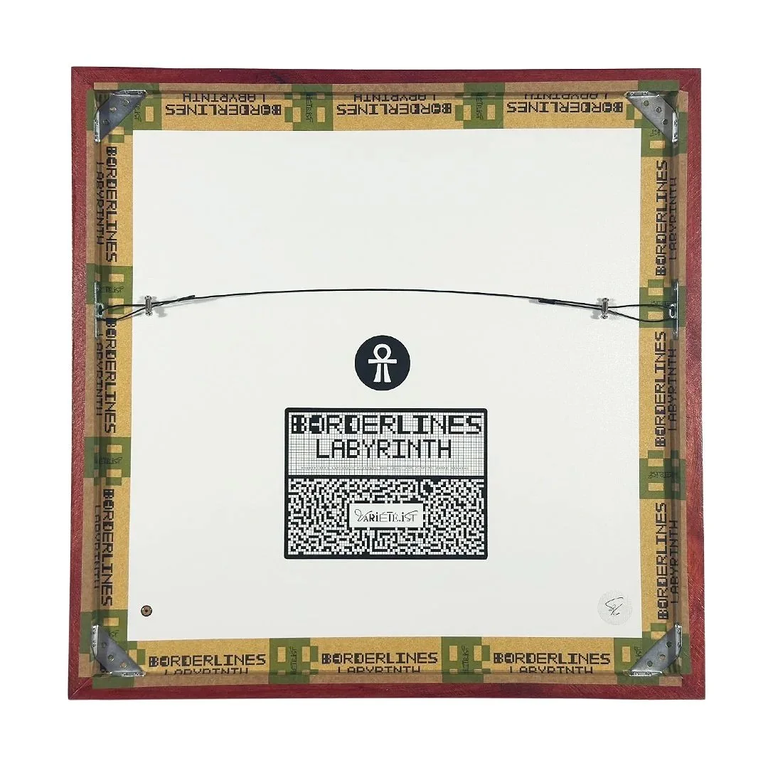 Back of a framed artwork titled 'Borderlines Labyrinth' with a signature sticker and themed Variété.ist stickers and logo, reinforced corners, and a wire hanger for wall mounting.