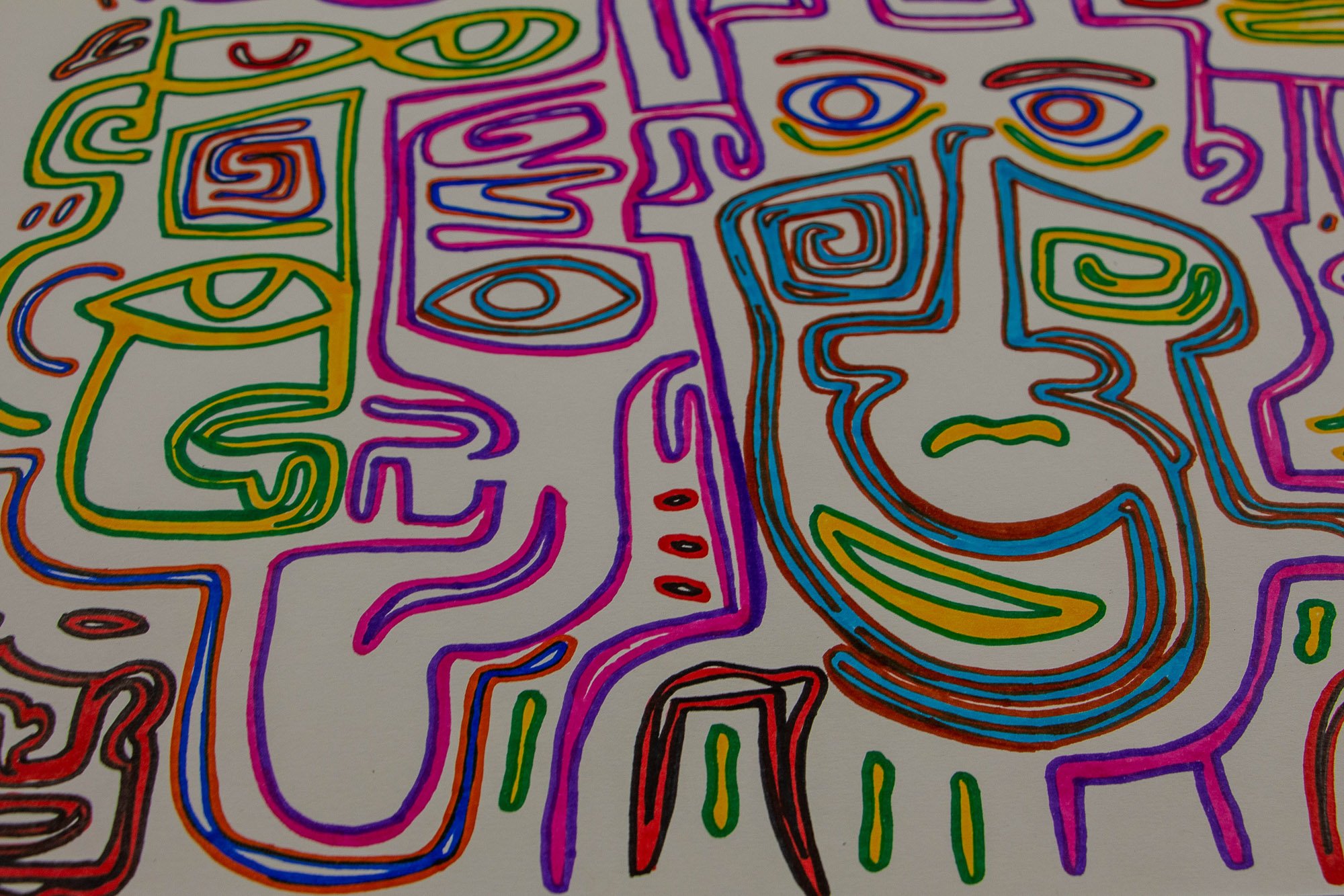 Eclipsing Gravitas 003 detail: close-up of adjacent face-like forms with pink-violet contours, blue and green features, spiral motifs, and a large curved green smile-like shape, set within a dense field of colorful linear symbols.