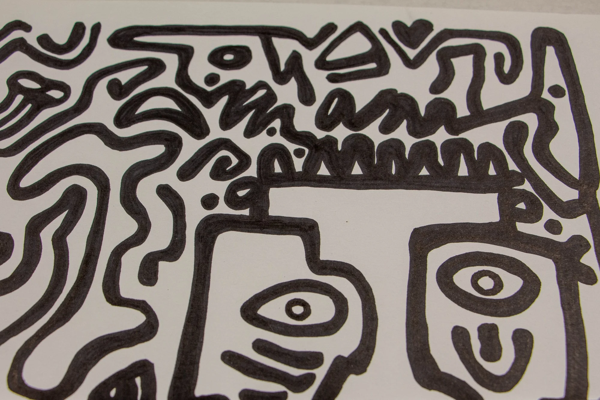 Veiled Alchemist 003 detail: upper-edge close-up with two simplified faces beneath a row of repeated vertical marks, surrounded by wavering lines, small symbols, and a heart-shaped accent.