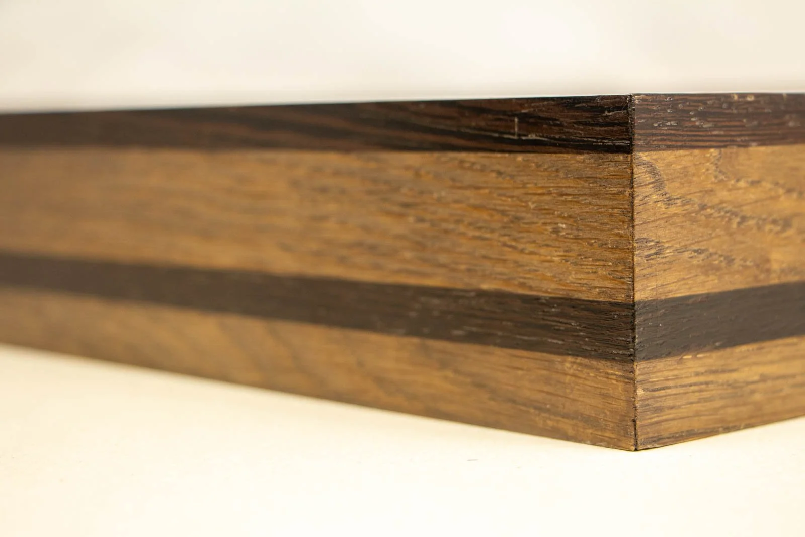 Synaptic Mythos 001 frame: outside mitre, cap and mid-band align neatly across the joint; crisp, tight corner