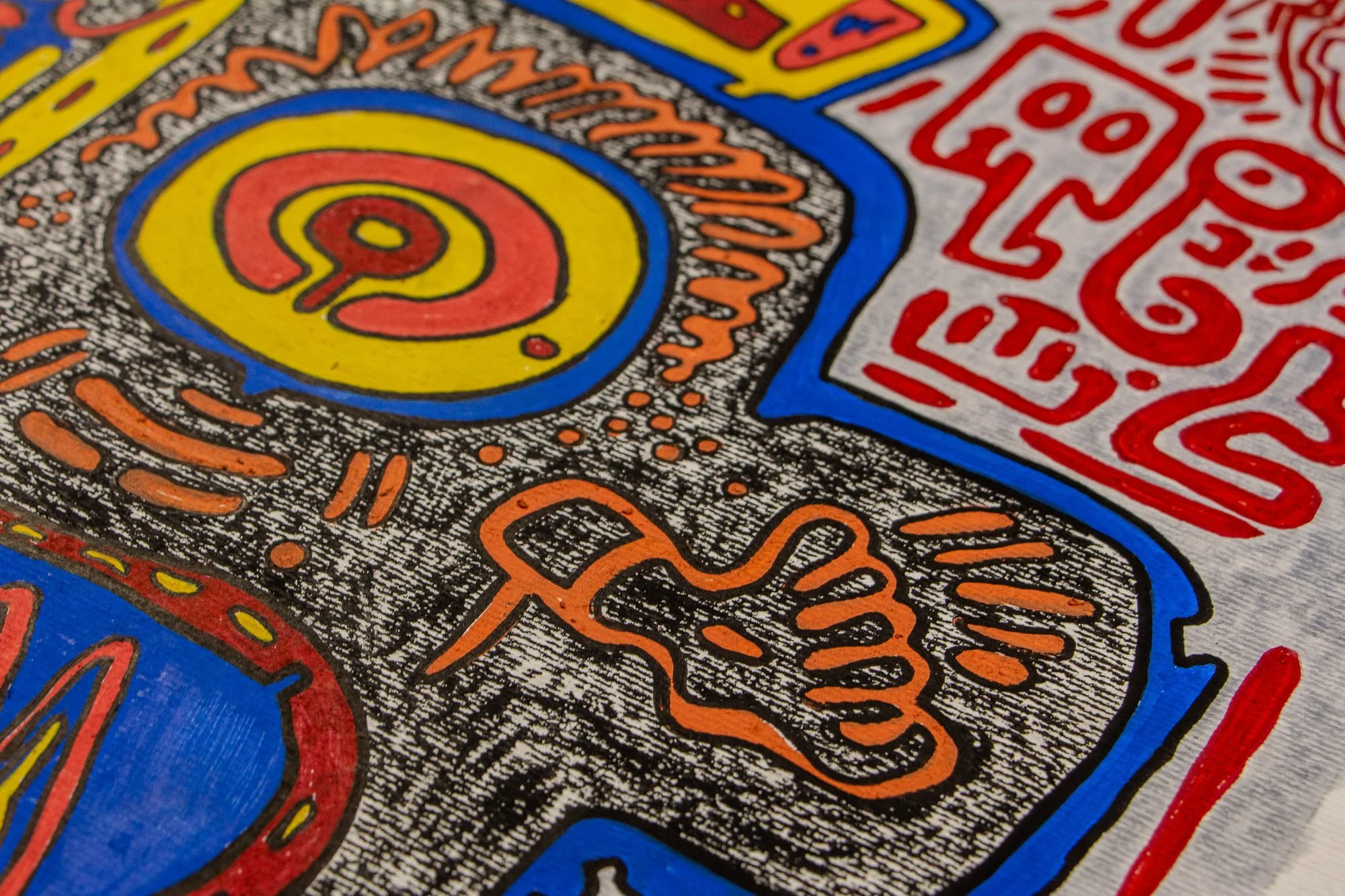 Unseen Signifiers 003 detail: angled close-up of the right eye area, where orange marks and a hand-like sign emerge from the textured black field beside the circular eye.