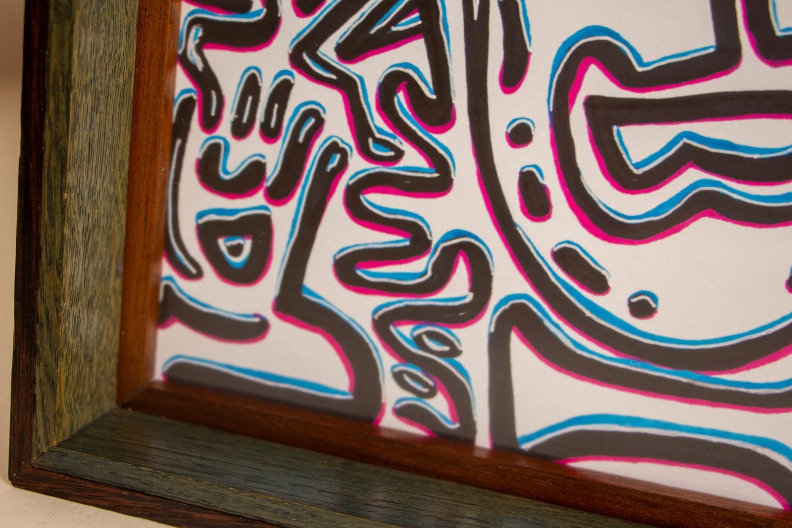 Silence’s Caesura 002 frame: left inner corner, full shadowbox depth; cool oak lines the well; paper floats evenly around the perimeter