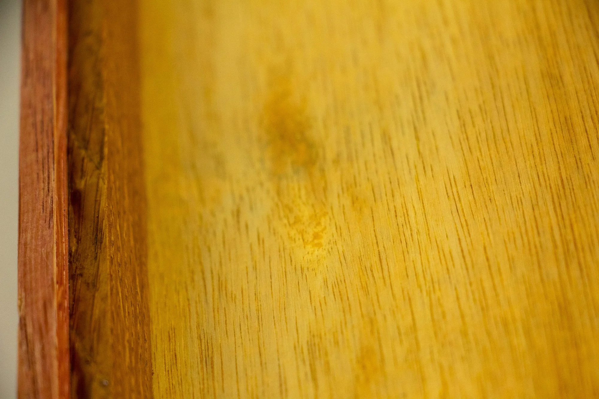 Eclipsing Gravitas 003 frame: close-up of the reverse side, showing the warm-toned plywood back panel and the inner frame edge, emphasizing the smooth finish, wood grain, and refined construction details.