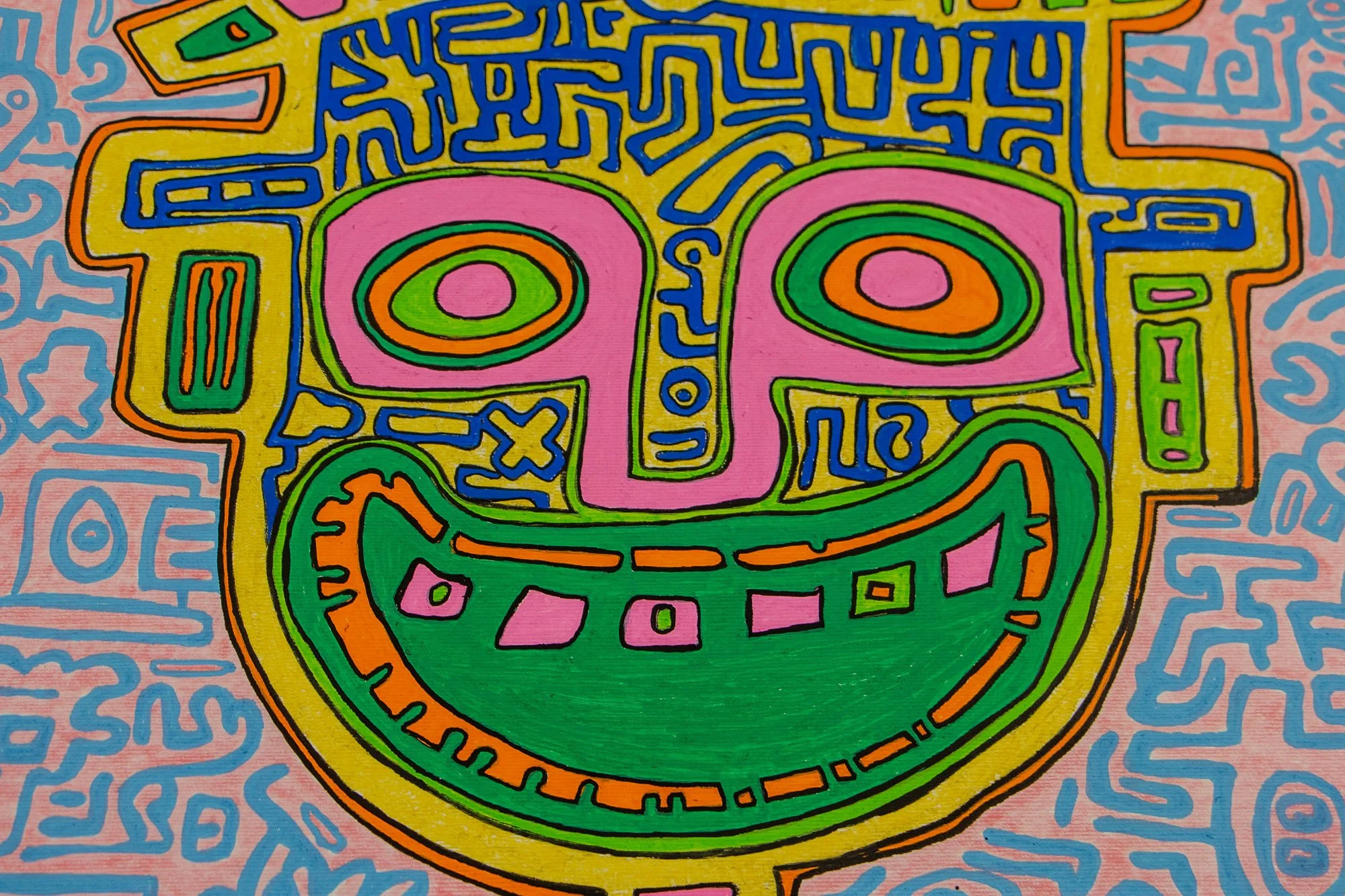 Unseen Signifiers 006 detail: frontal close-up of the central face-like figure, showing the yellow head, pink eyes, blue forehead linework, and the large green grin against the pink ground.