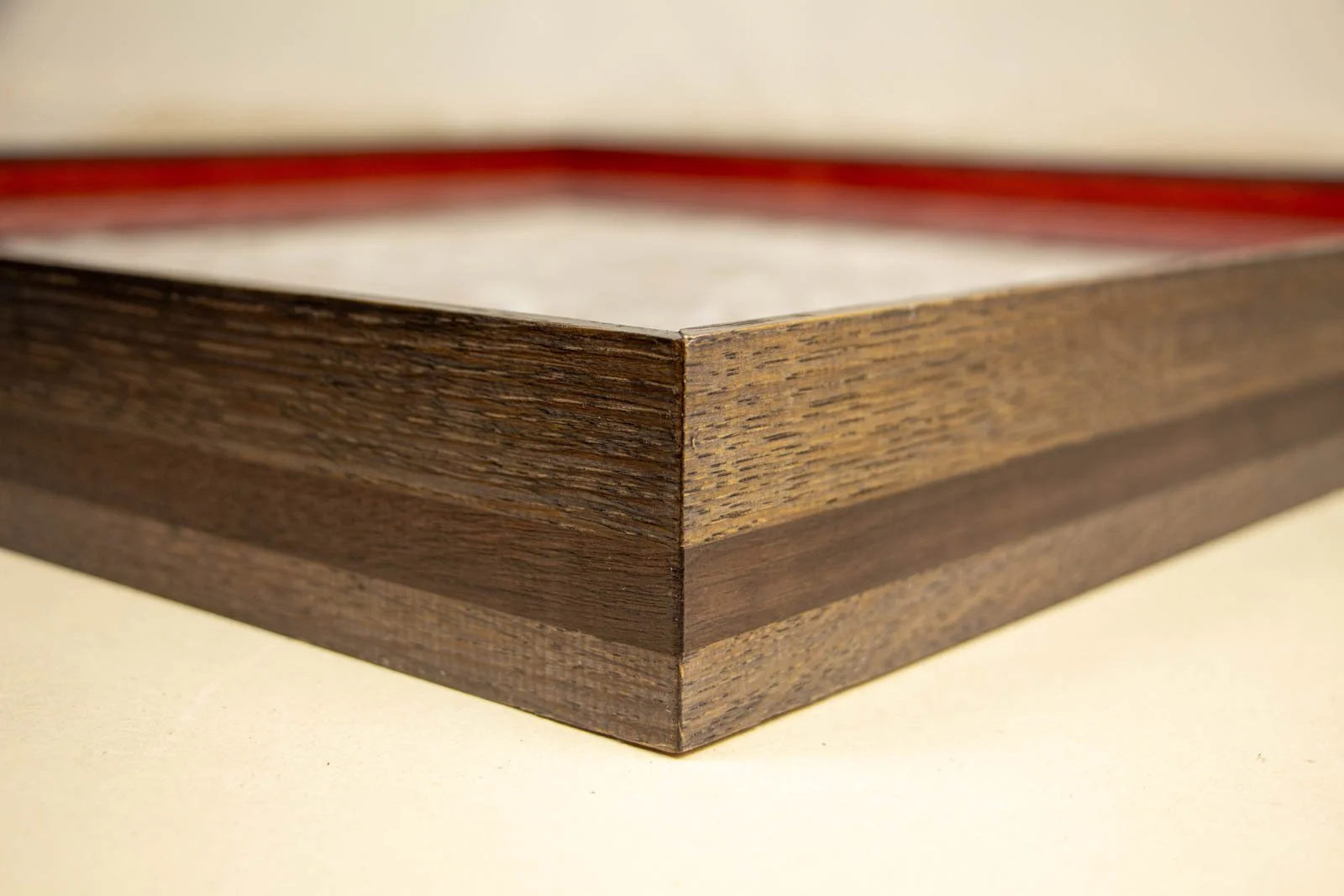 Flux Impromptu 003 frame: oak and walnut, outside mitre, clean 45° join; the red inside line wraps crisply around the corner