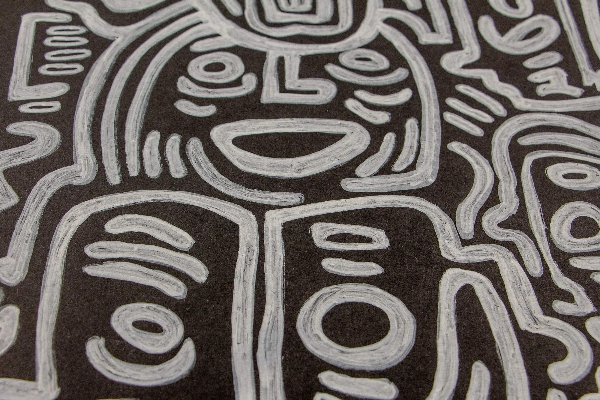 Mêlée of Discovery 005: close-up of a large central figure with a wide oval mouth and rounded lower forms, surrounded by smaller eye and cheek motifs.