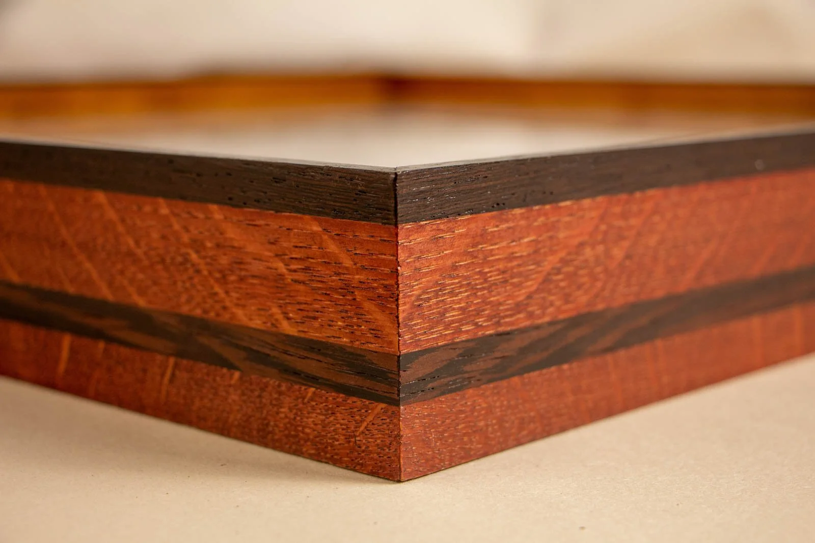 Formless Equation 004 frame: oak frame with wengé edge, clean mitered corner joint, glass seated flush