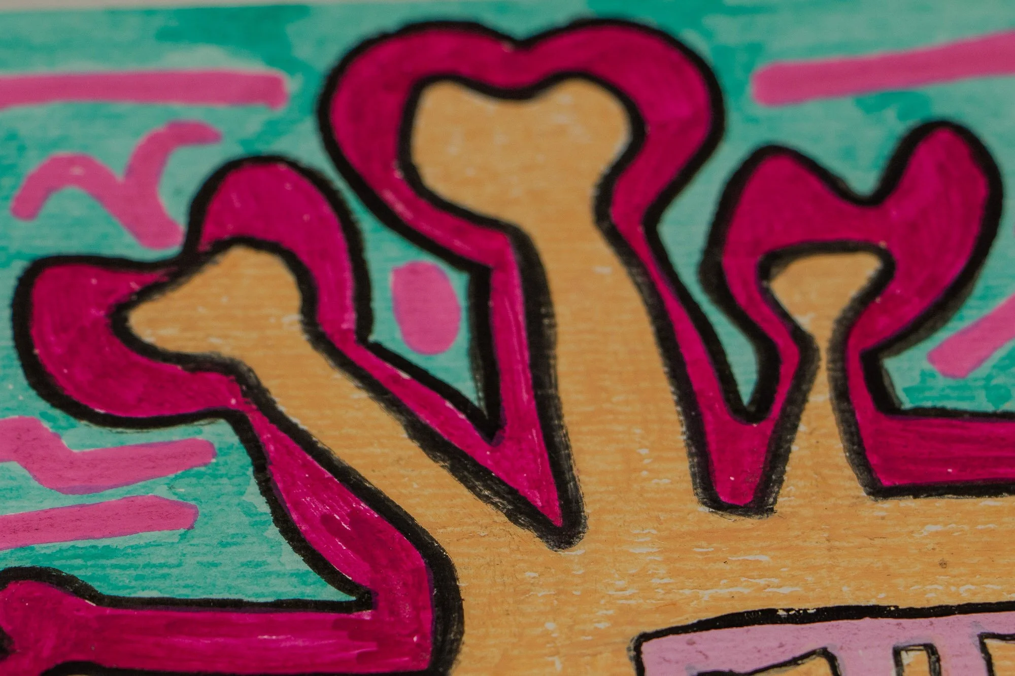 Unseen Signifiers 004 detail: close-up of the upper facial structure, where magenta heart- and bone-like forms rise from a peach band against a turquoise background marked with pink symbols.