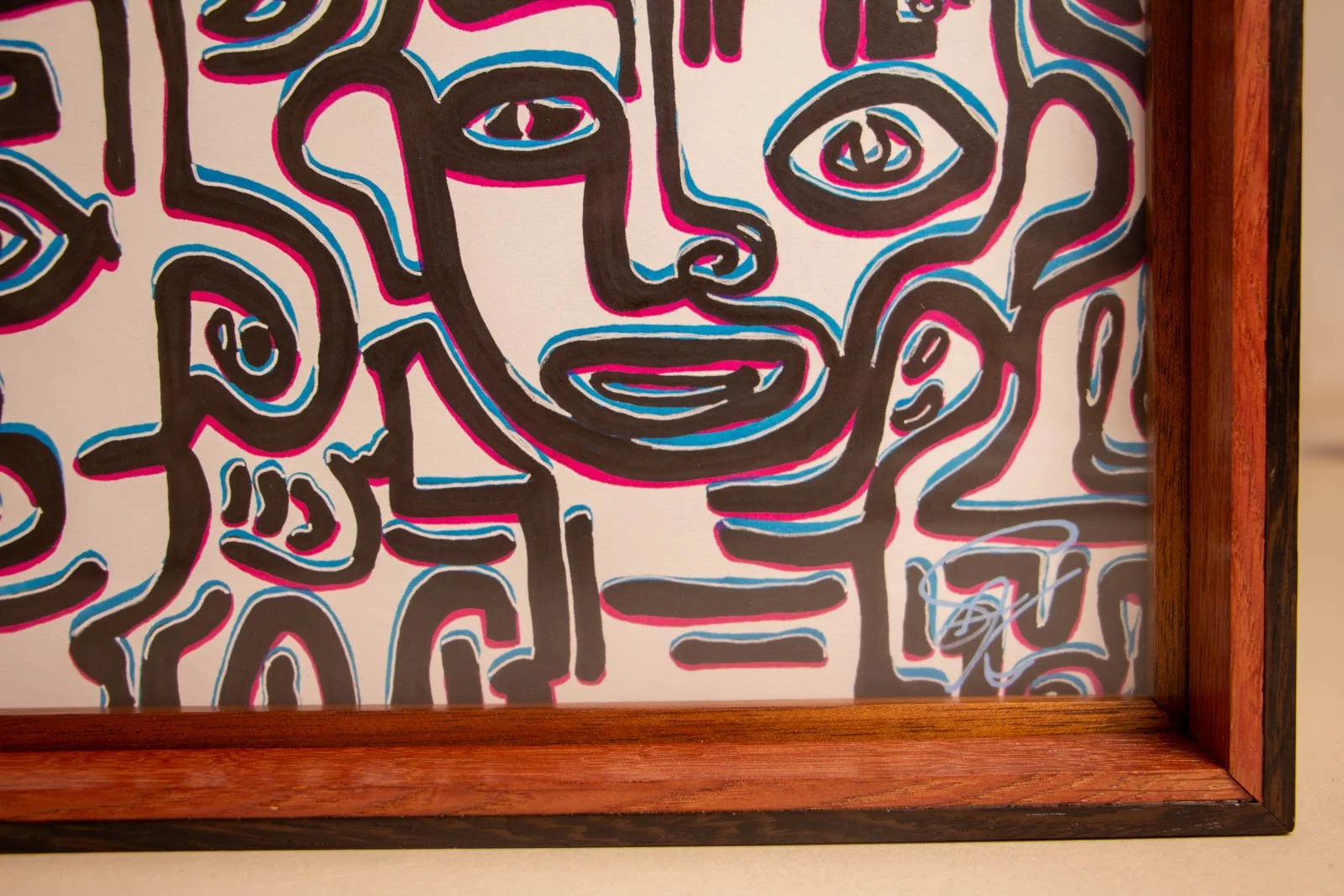 Silence’s Caesura 001 frame: lower right, artist’s mark beside the float; pink liner and wengé cap frame the signature