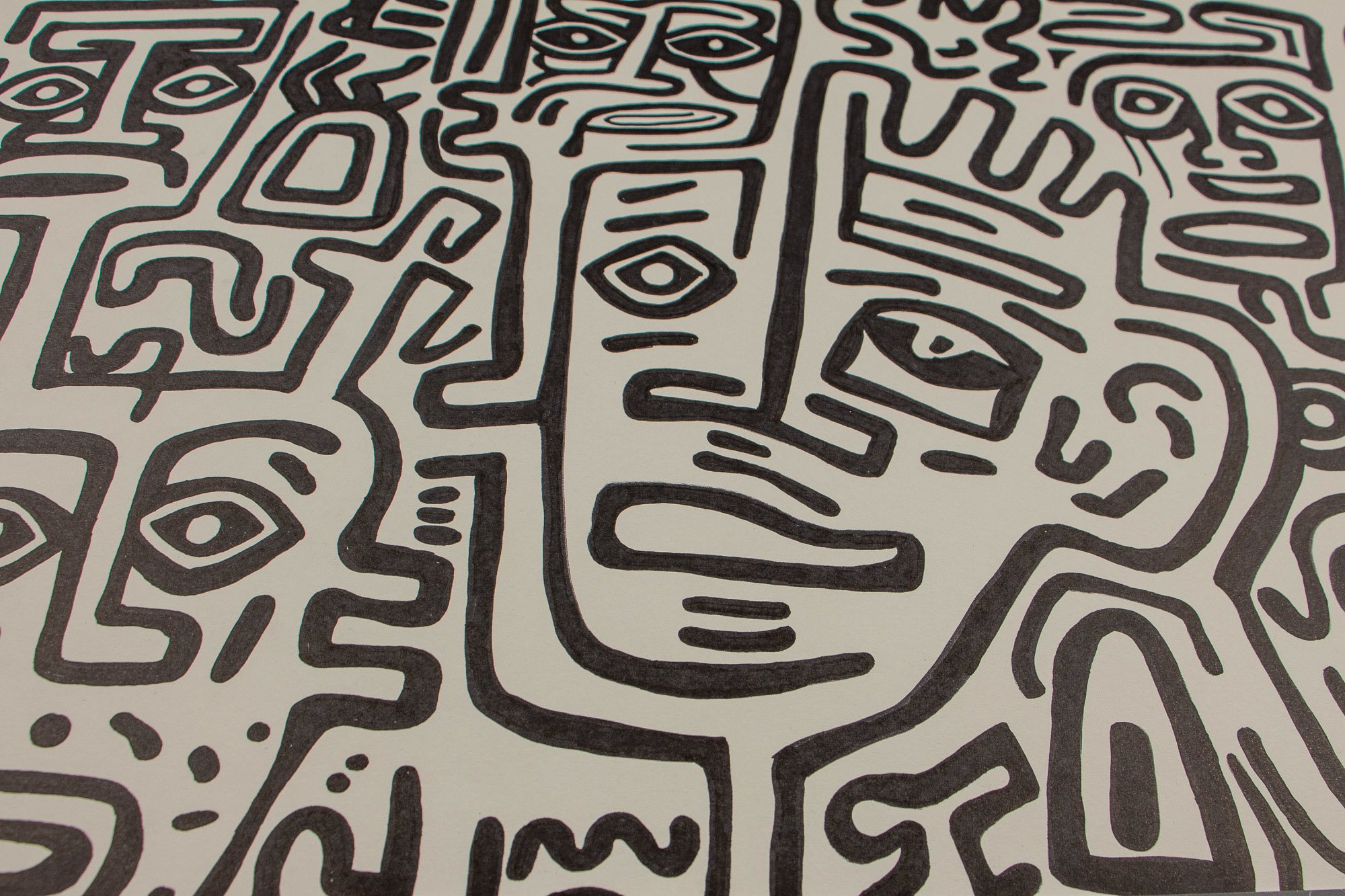 Resonant Syntax 004 detail: angled close-up of the central tilted face, with one framed eye, one almond eye, a long horizontal mouth, and surrounding black contour lines moving through adjacent forms on warm white paper