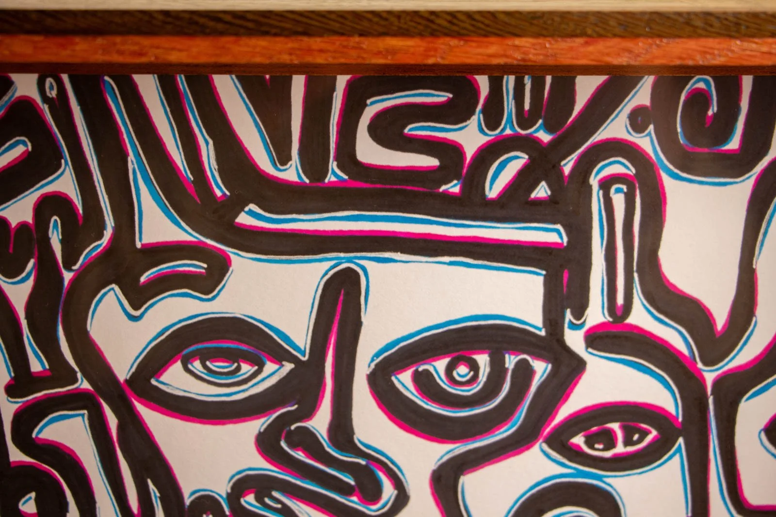 Silence’s Caesura 001 frame: upper margin, white paper floats with a slim shadow; pink/blue ink echoes ride the edge