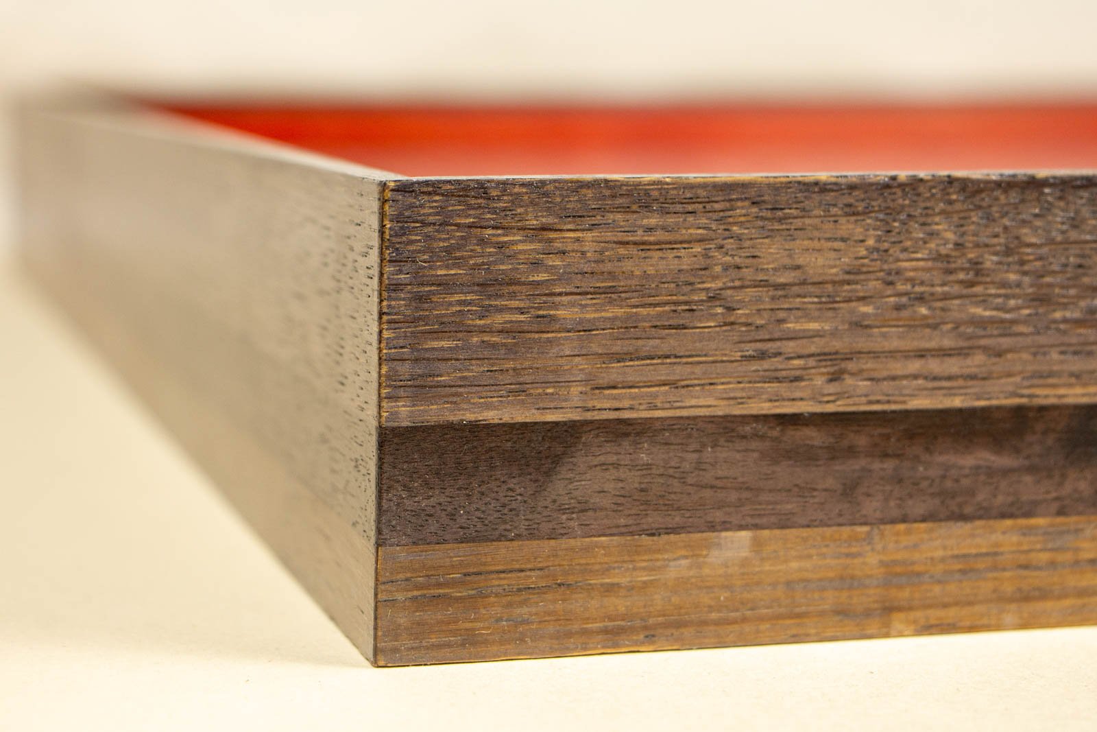 Flux Impromptu 001 frame: outer corner, dark oak frame with a continuous walnut inlay band; tight miter, satin sheen