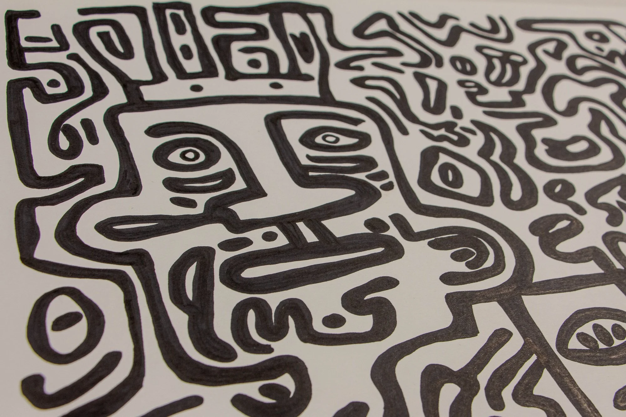 Veiled Alchemist 003 detail: angled close-up of a crowned or helmet-like face with wide circular eyes, a horizontal mouth, and layered linear forms extending into the surrounding composition.