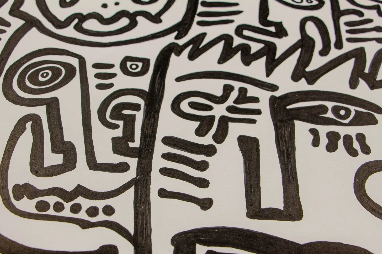 Formless Equation 004 detail: central face with eye, zigzag hairline, matte ink on paper, visible texture