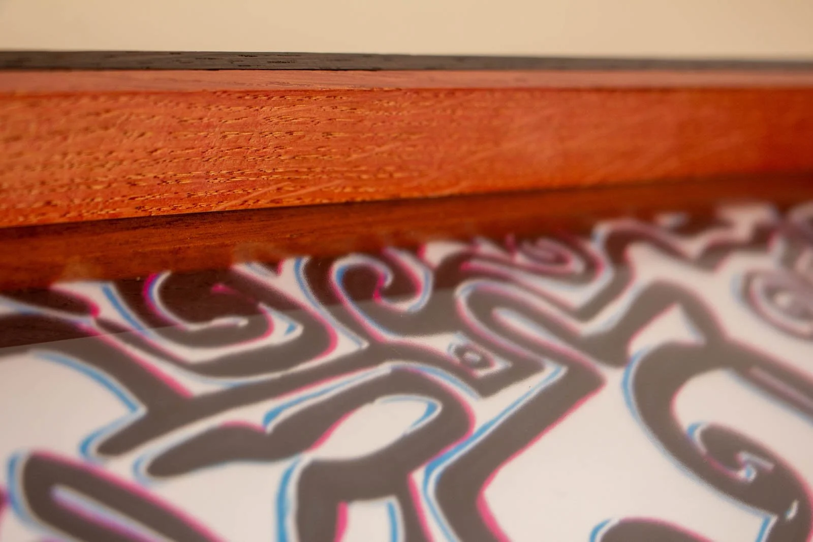 Silence’s Caesura 001 frame: inner throat, rose liner runs true beneath the lip; soft reflections on the glass emphasize depth