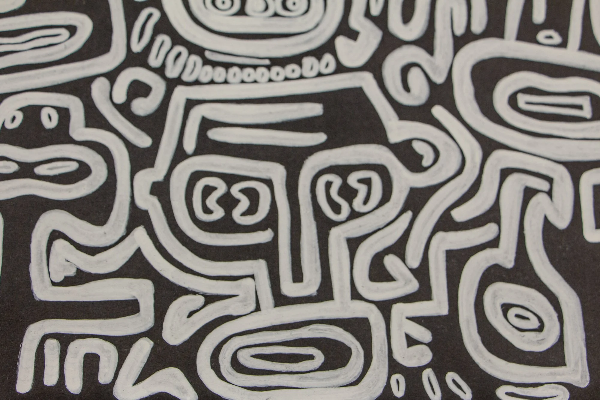 Turbulent Aegis 002 artwork detail: close-up of a stacked central figure with circular and rectangular features, surrounded by dense white-lined forms that build rhythm, pressure, and containment.