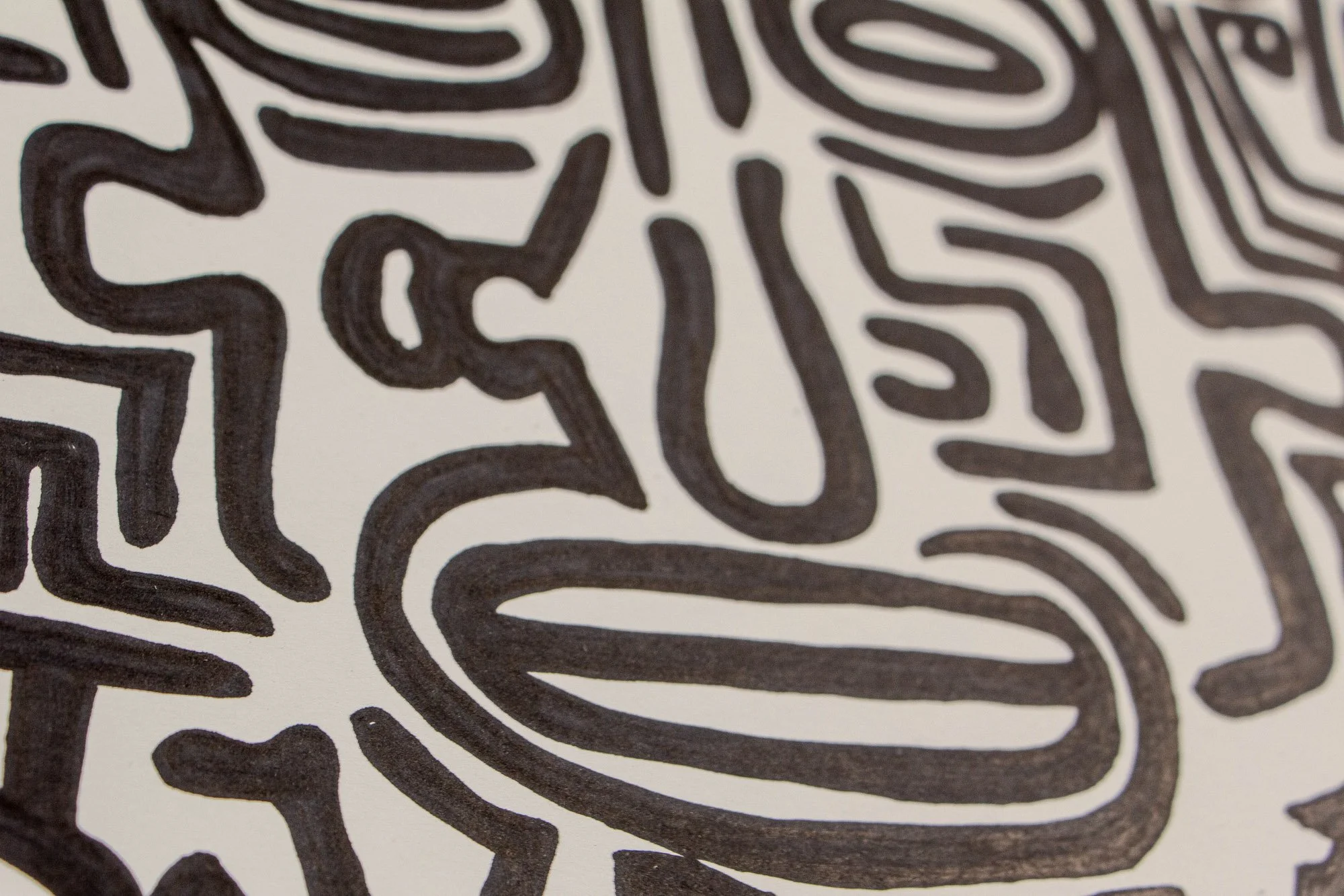 Mêlée of Discovery 004: close-up of a stylized face with wide-set eyes and a long horizontal mouth, drawn in thick black lines against the white ground.