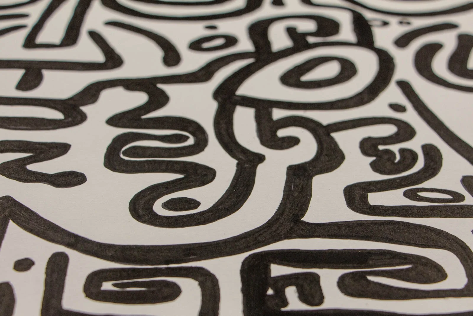 Formless Equation 002 detail: right-side face with long nose and tight curls, steady line weight, ink on paper