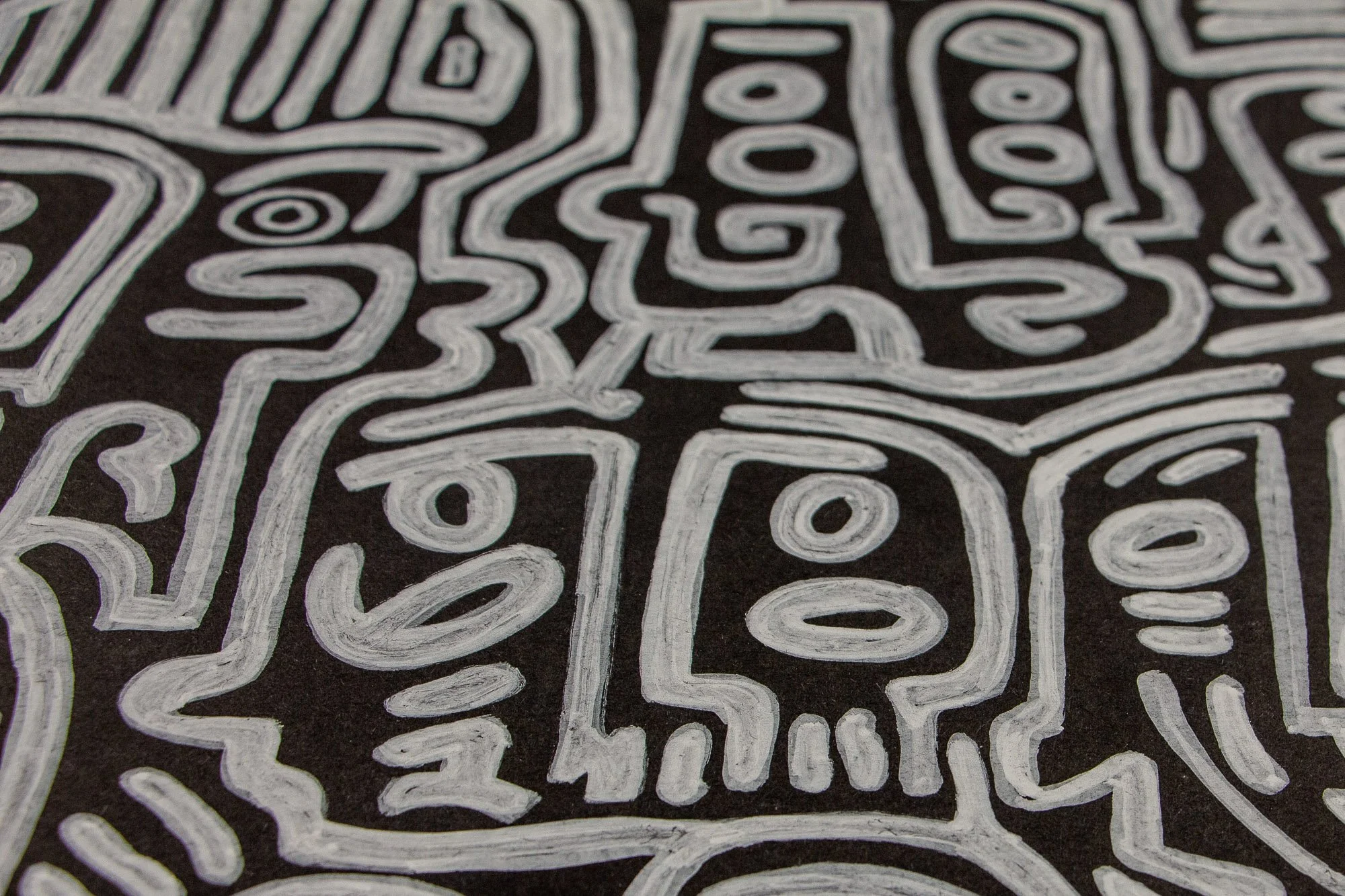 Mêlée of Discovery 005: detail of clustered geometric faces and stacked symbols, showing how the composition builds through repetition and variation.