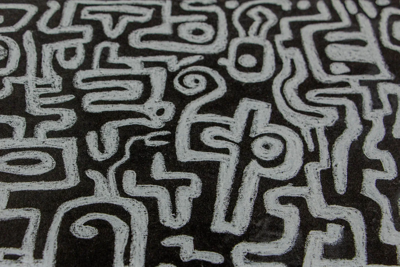 Synaptic Mythos 001 detail: dense field of glyphs, hooks, spirals and seed/eye shapes; variable opacity reveals the paper’s tooth; crisp edges alternate with soft, re-worked seams