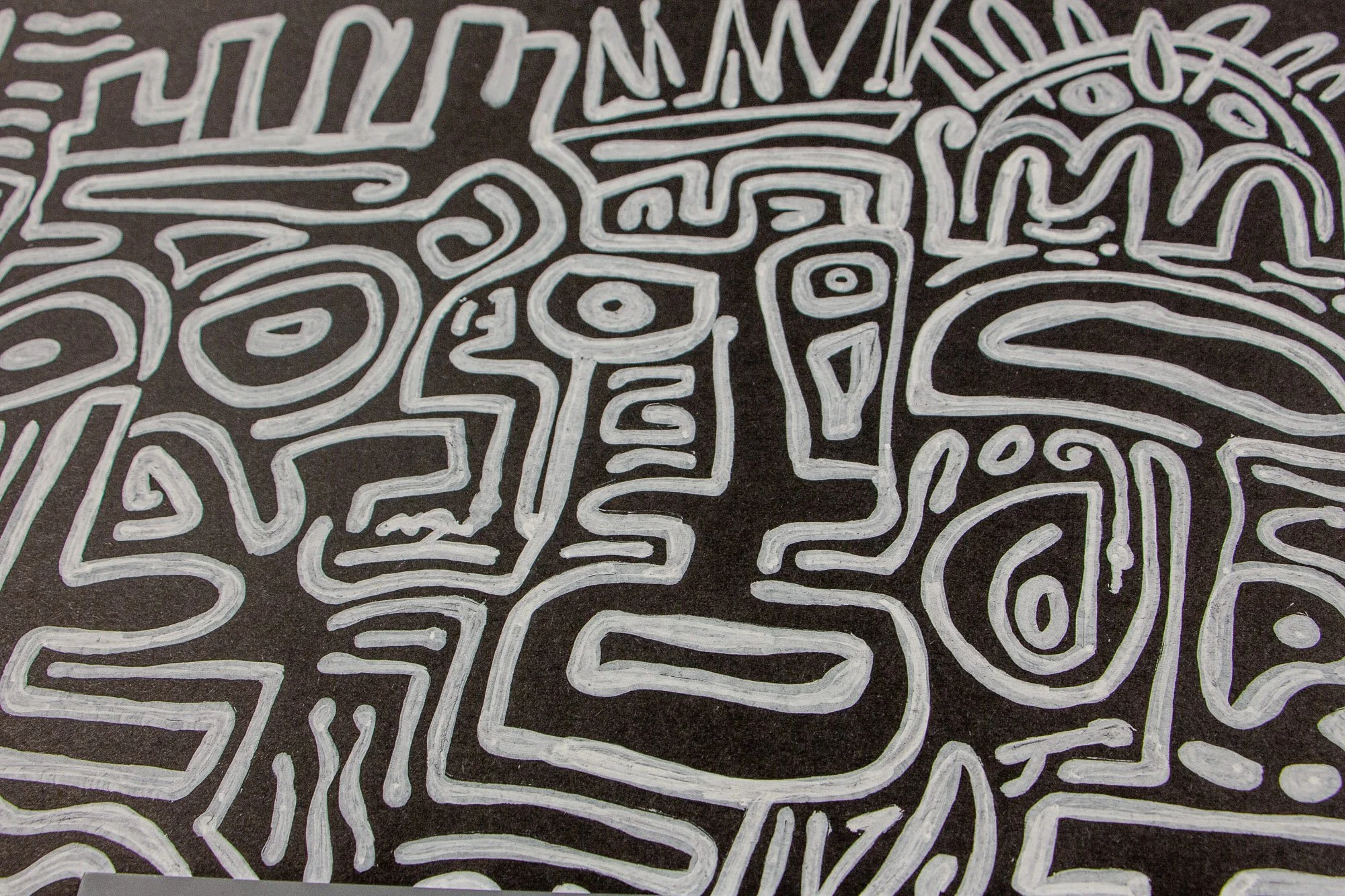 Mêlée of Discovery 003 detail: close-up of interwoven facial signs and abstract shapes, where white contours press against one another and create a tightly packed visual cadence.