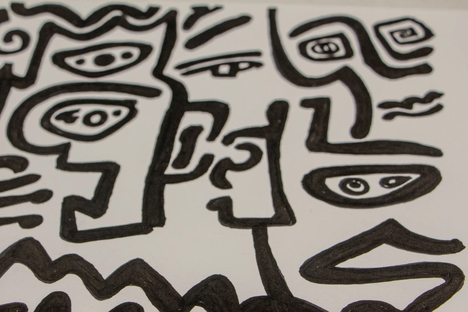 Formless Equation 004 detail: cluster of eyes and profiles with spiral accents, calligraphic lines, ink on paper