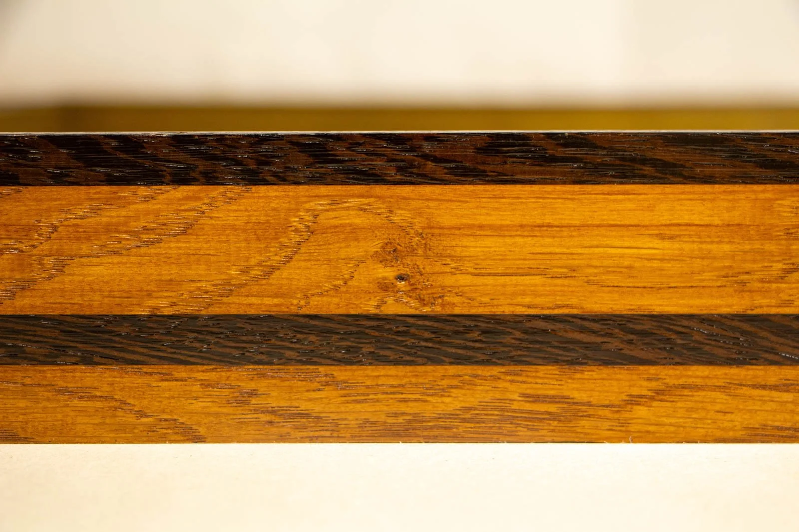 Metamorphic Entwining 003 frame: close side section highlighting oak cathedrals and knot; crisp separation of the wengé band