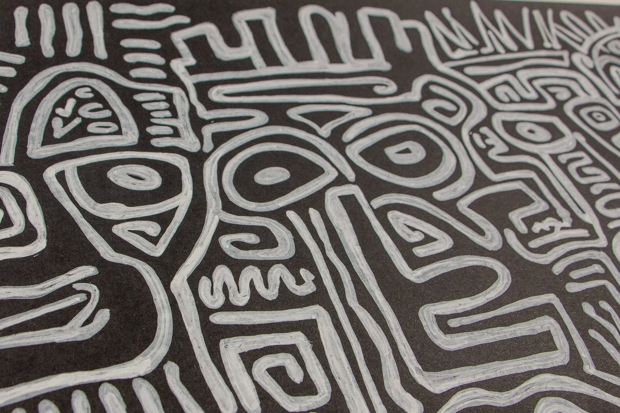 Mêlée of Discovery 003 detail: close-up of white linework on a dark ground, where facial fragments, eyes, and curved bands interlock in a dense, shifting field.