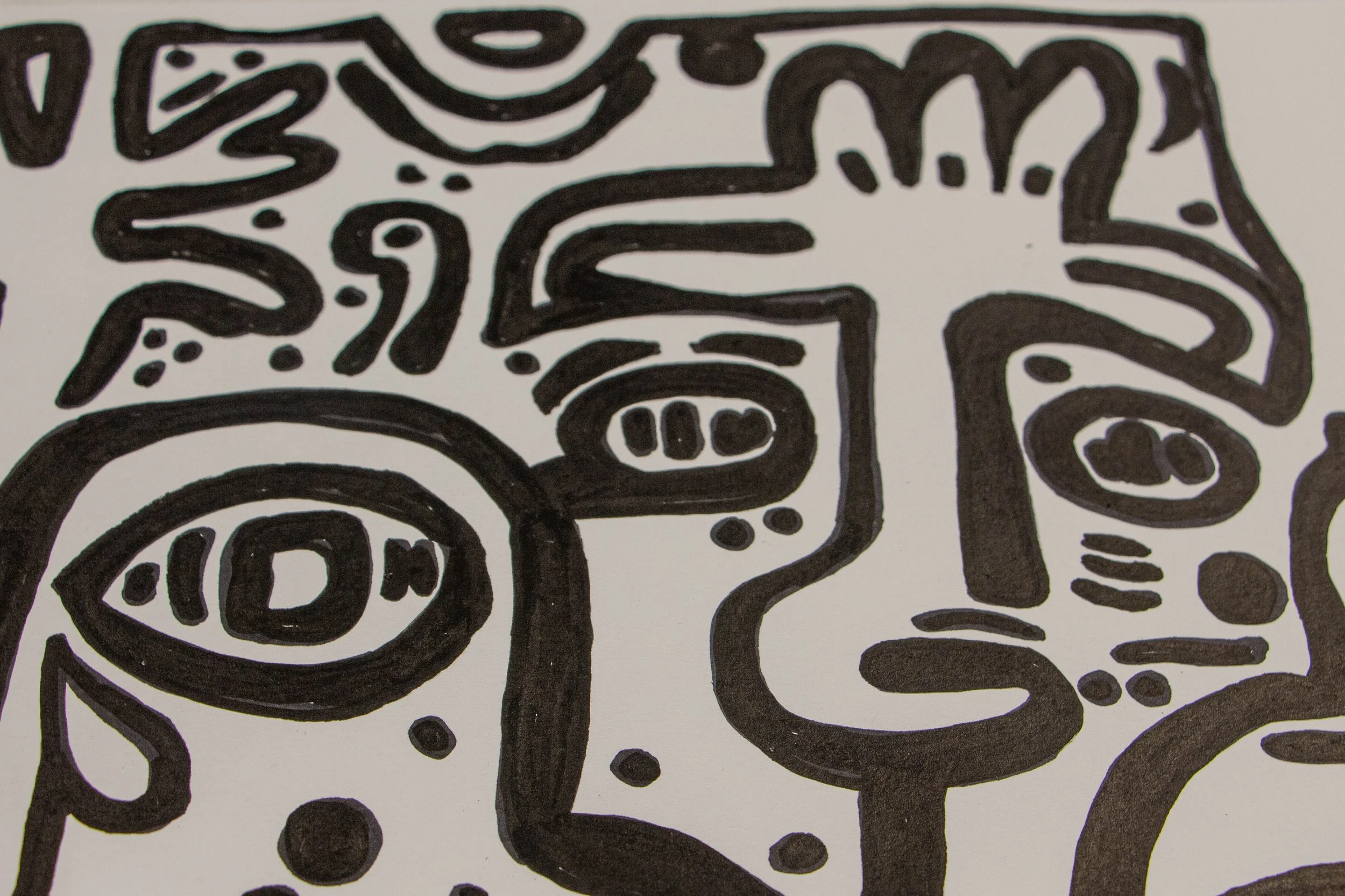 Formless Equation 001 detail: crowned head and neighboring face with patterned eyes and brows, strong contour lines, ink on paper