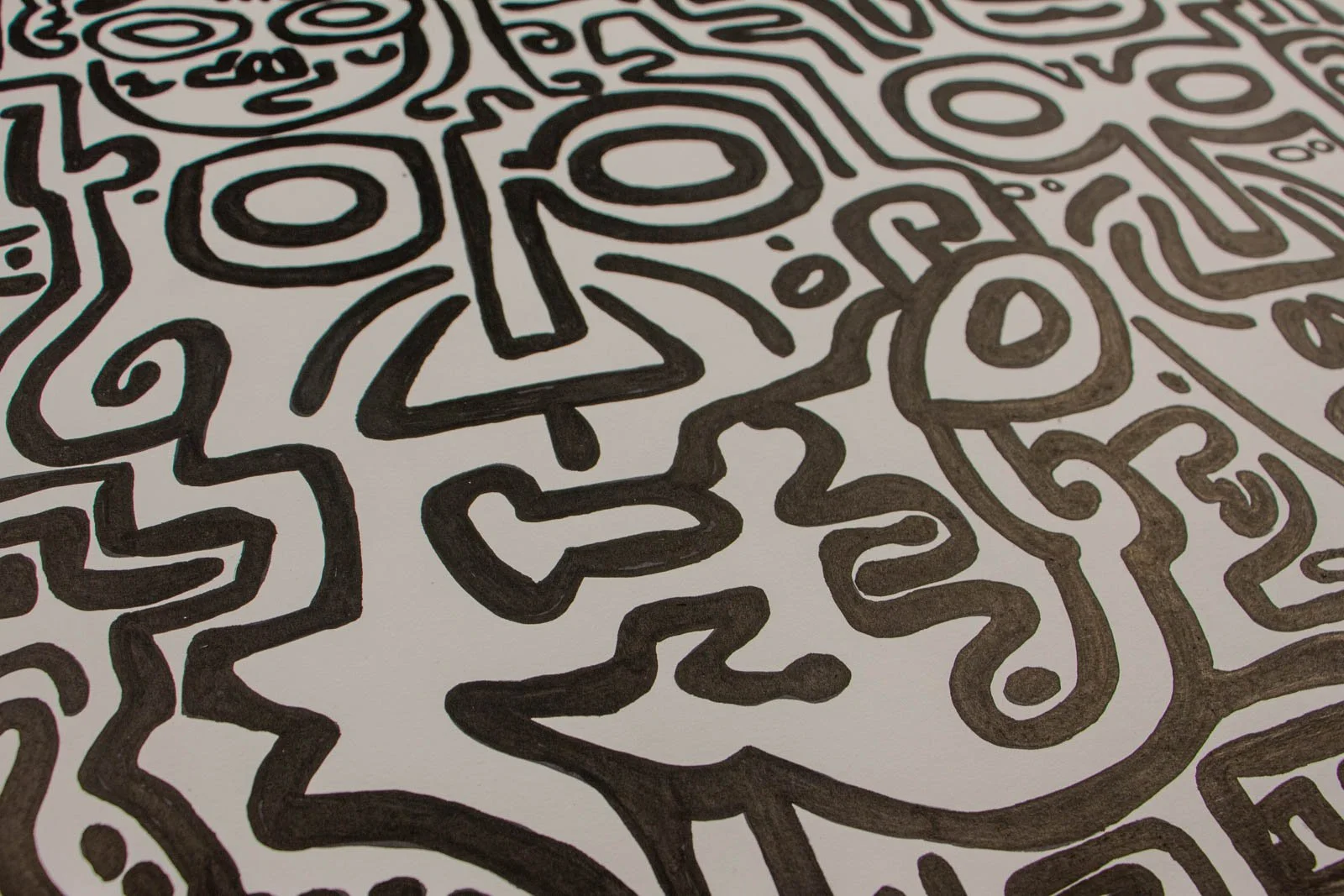 Formless Equation 002 detail: large oval eye forms with triangular nose motif, flowing contours, ink on paper