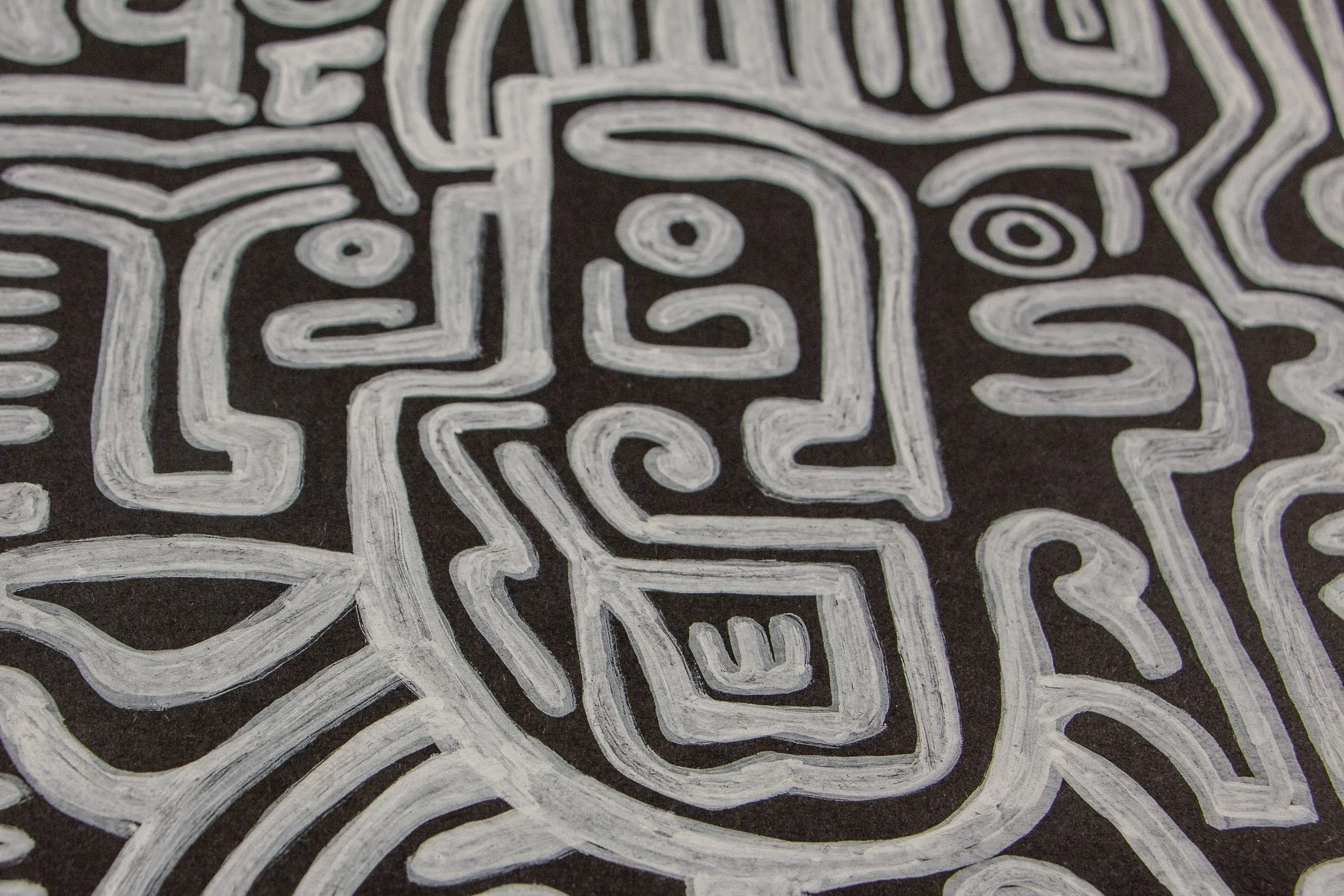 Mêlée of Discovery 005: cropped detail of the central crowned figure, focusing on the boxed mouth, curved cheek line, and dense surrounding markings.