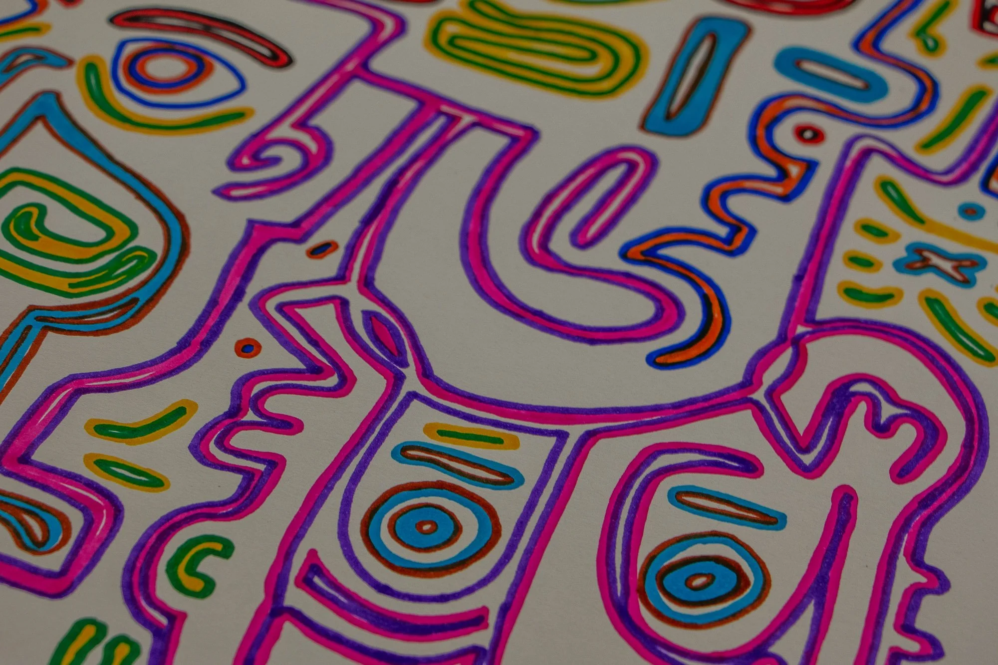 Eclipsing Gravitas 003 detail: angled close-up of interlocking pink and violet face-like contours, with blue-ringed eyes, green and yellow accents, and flowing linear forms moving diagonally through the composition.