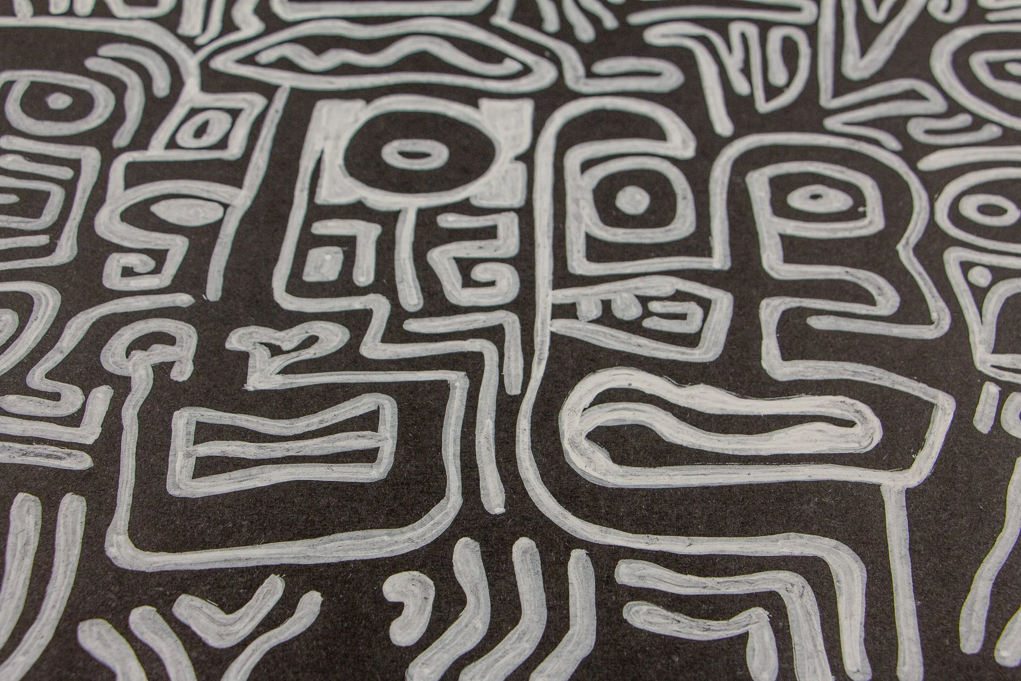 Mêlée of Discovery 003 detail: angled close-up of clustered faces and geometric signs, highlighting the series’ language of polarity, repetition, and continuous internal reorganization.