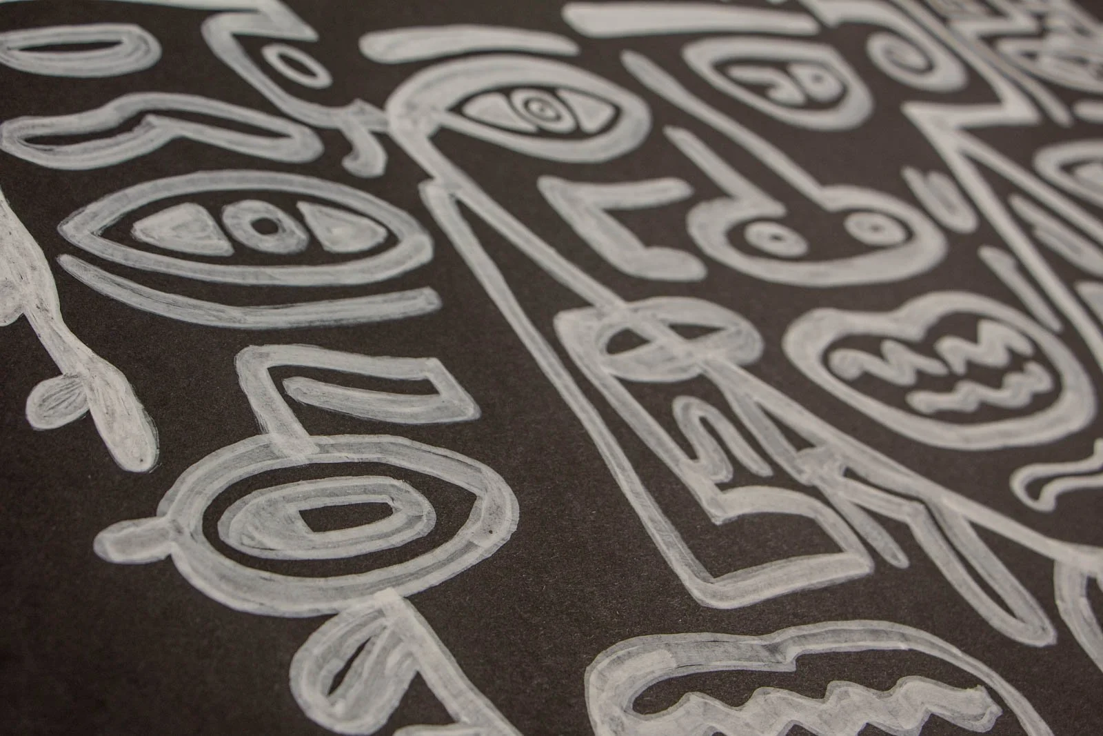 Metamorphic Entwining 004 detail: raking view along the surface, rhythmic chain of eye/seed shapes and a long tapering contour; semi-opaque paint body with subtle streaking