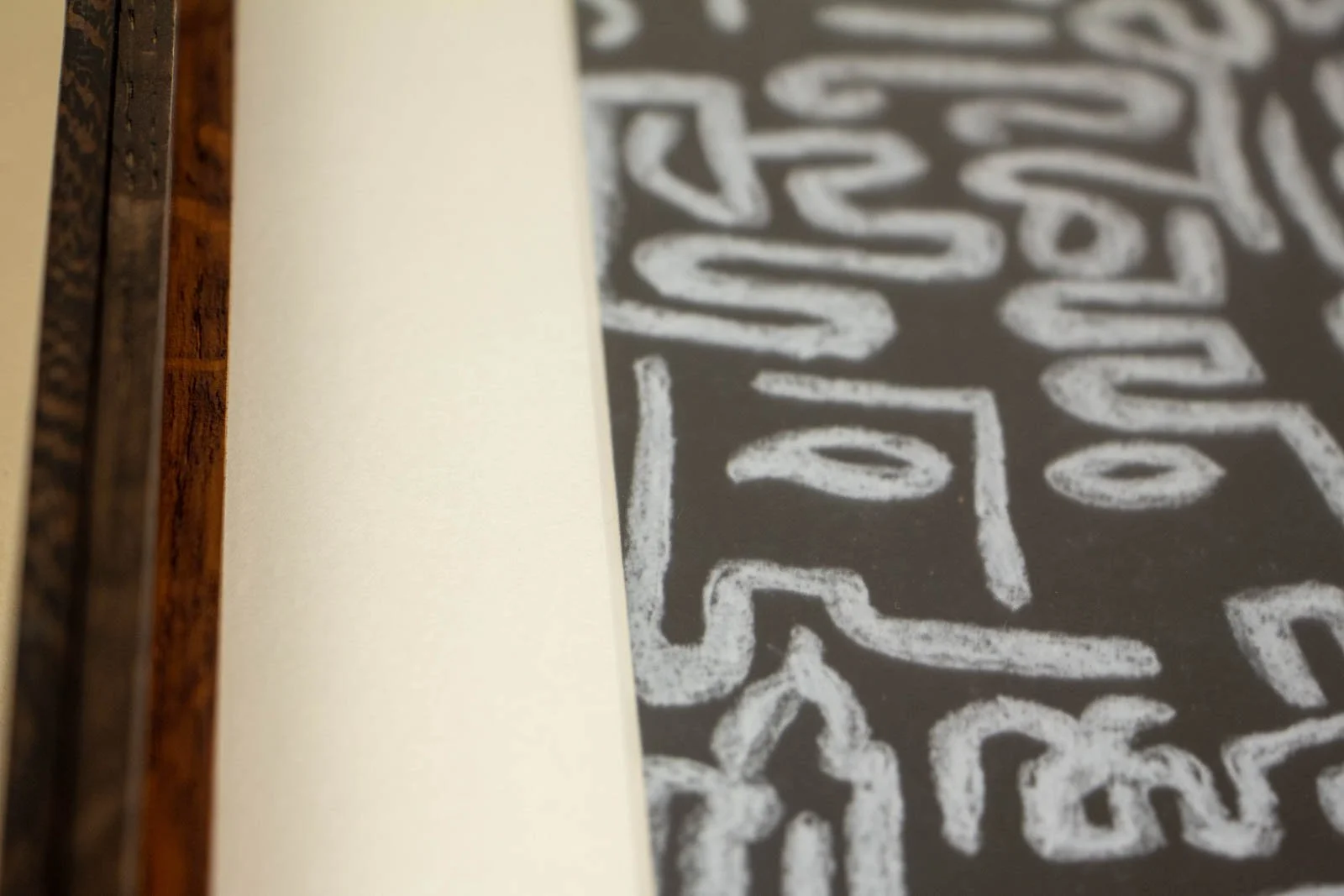 Synaptic Mythos 003 frame: look along the inner wall, depth of the rabbet visible; glazing, spacer, and mat stack create a soft shadow gap