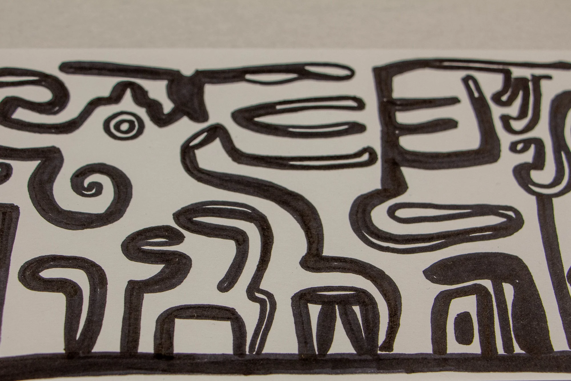 Veiled Alchemist 002 detail: close-up along the upper edge of the drawing, showing elongated black forms, spiral accents, and architectural line structures moving across the white ground.