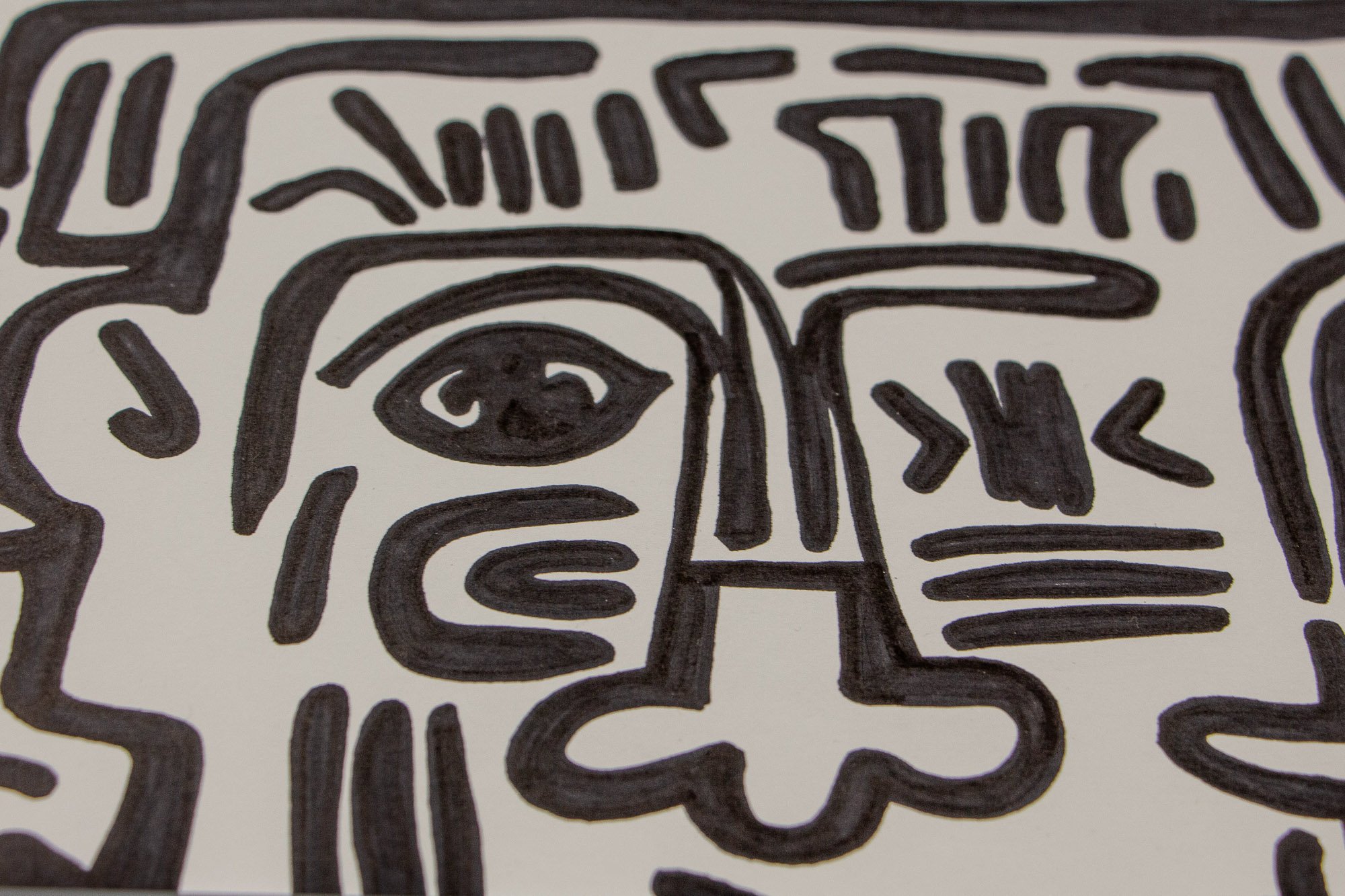 Mêlée of Discovery 004: cropped detail centered on a long oval mouth and surrounding linear marks, emphasizing the hand-drawn rhythm of the black contours.