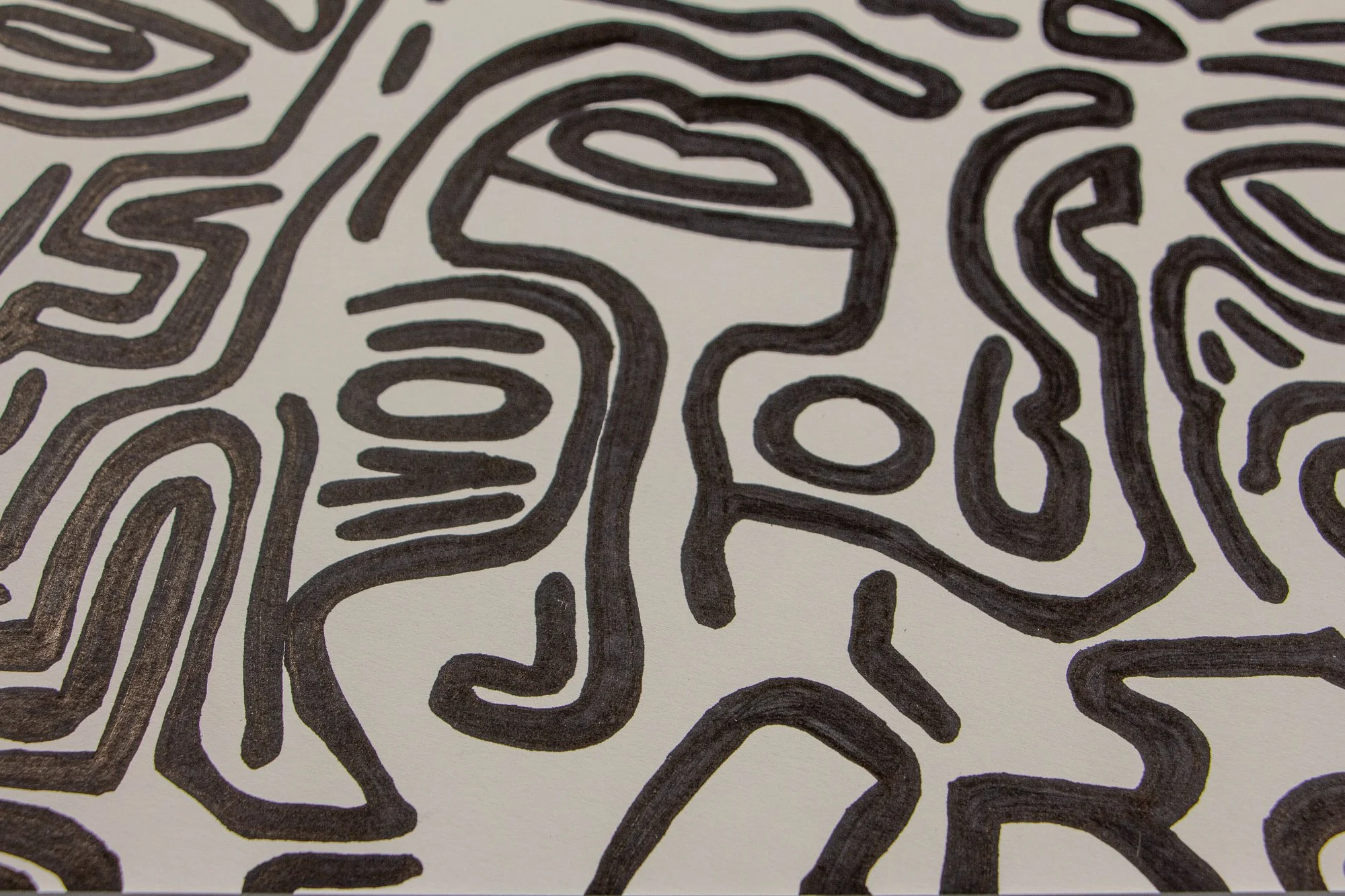 Mêlée of Discovery 002 detail: close-up of interwoven facial and abstract elements, where rounded forms, nested lines, and small internal marks create a layered visual rhythm.