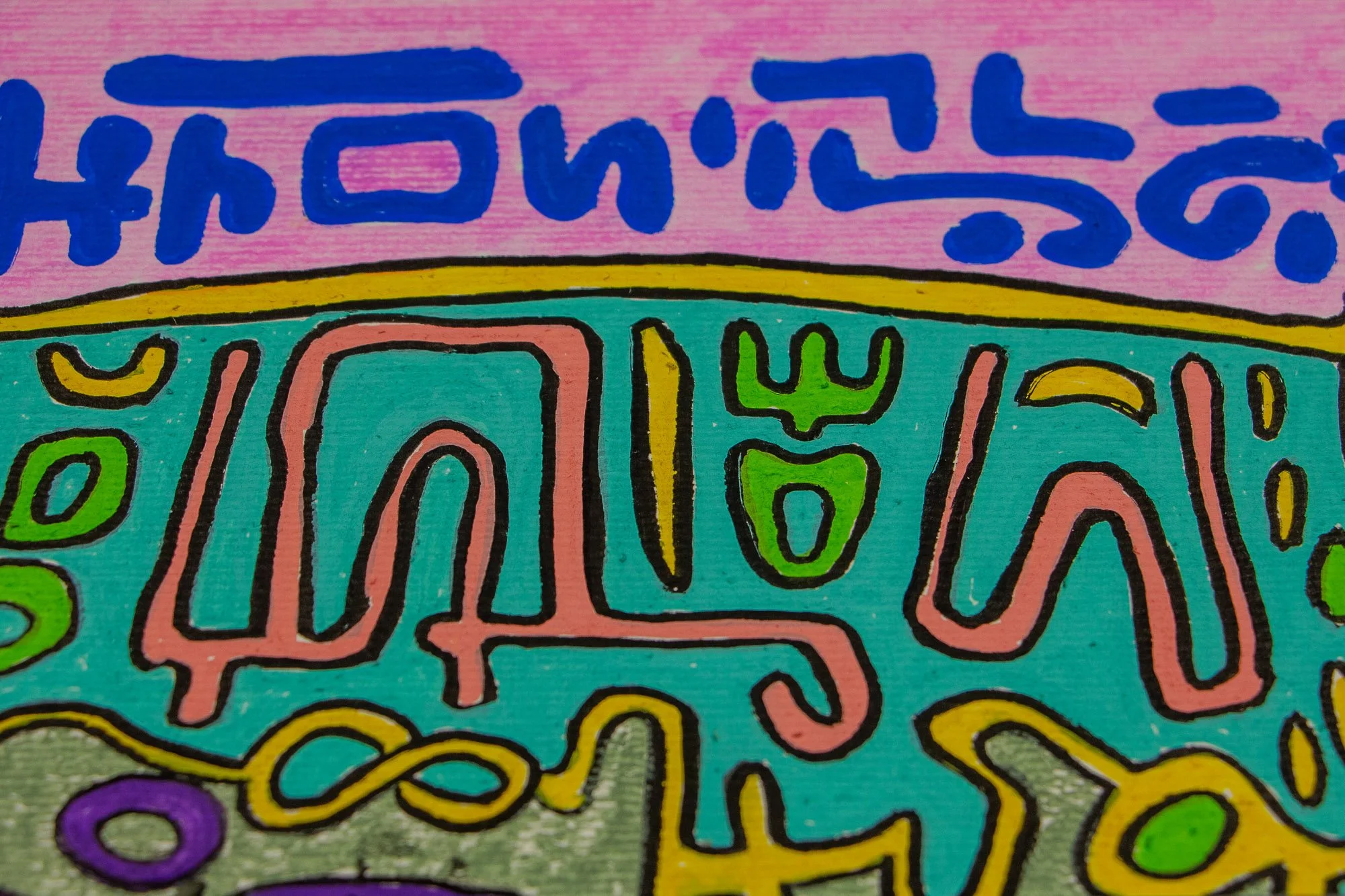 Unseen Signifiers 007 detail: close-up of the turquoise upper band with pink and green symbols, bordered by a thin yellow line above the olive-green face area.